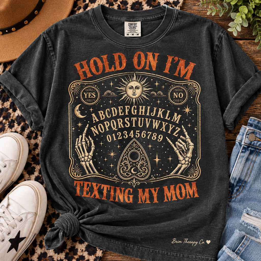 Hold On I’m Texting My Mom Ouija Board Graphic Tee – Vintage Halloween Design